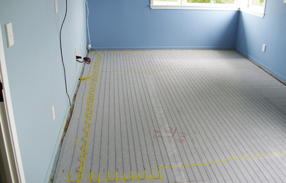 photo showing heating elements before the carpet is installed on top